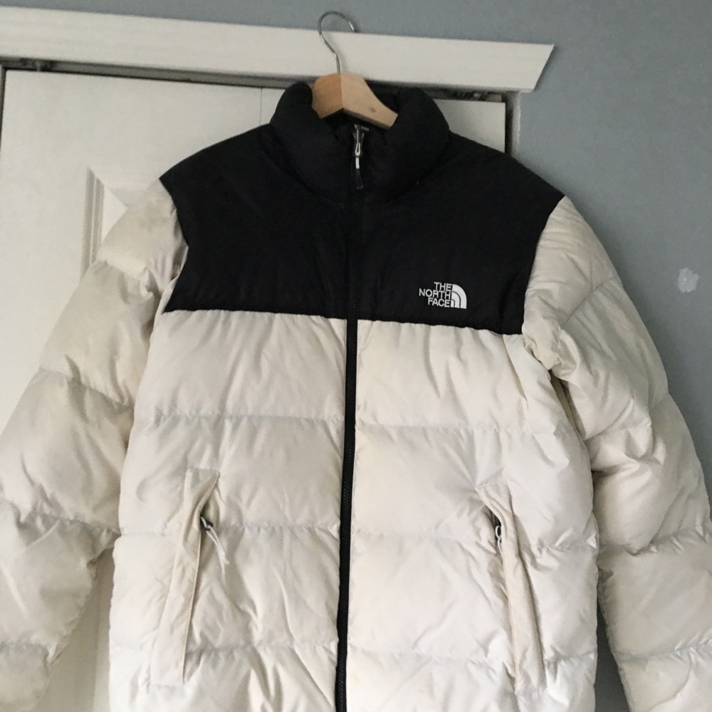 The North Face Used Jacket Has two small spots on front of the jacket